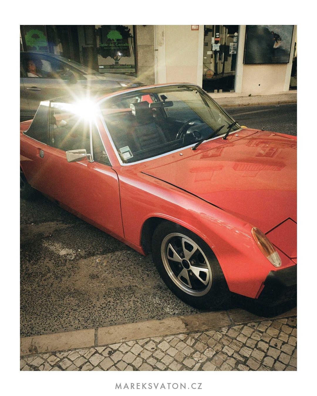 Porsche 914 side view with sun star